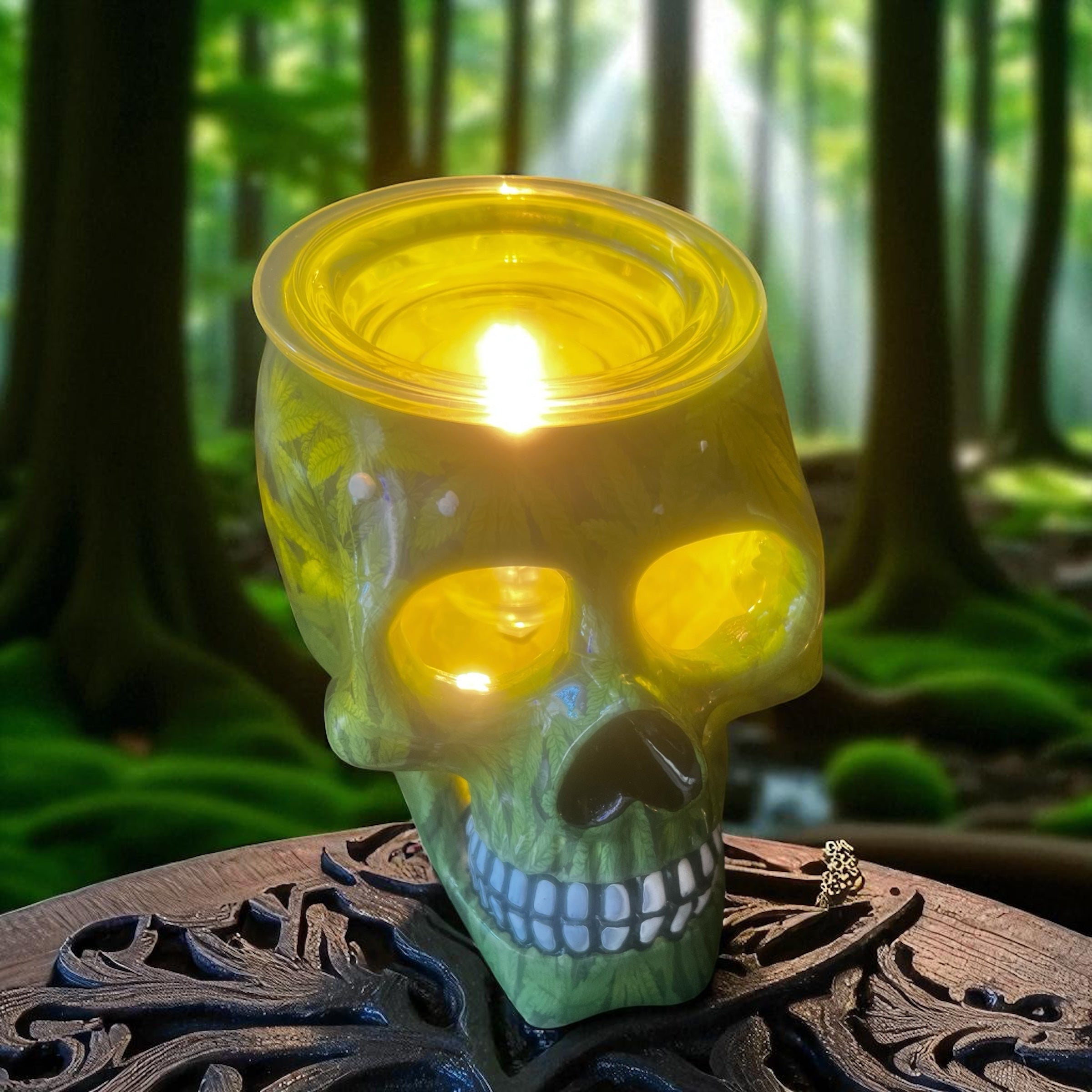 Selected Scent electric decorative warmer shaped like a glowing yellow skull on wooden surface