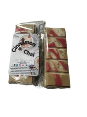 Selected Scent cinnamon chai scented home decor wax melts with red and beige swirls in clear packaging