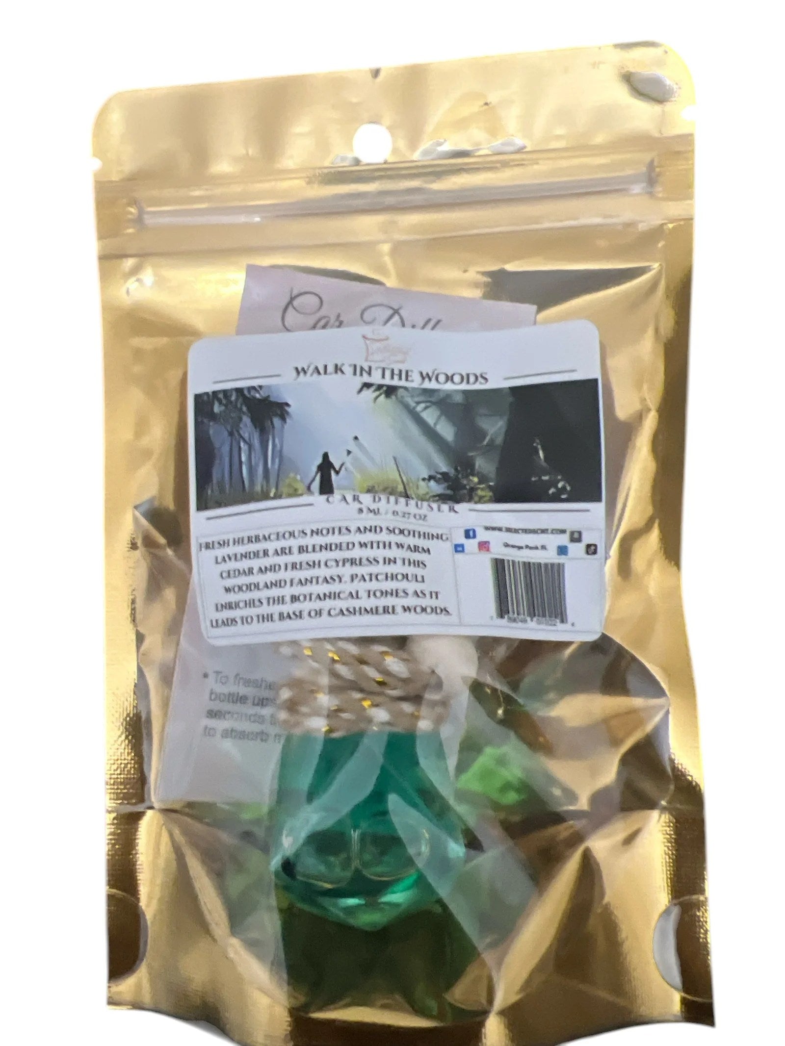 Selected Scent Walk in the Woods long lasting car air freshener in green bottle with gold resealable packaging