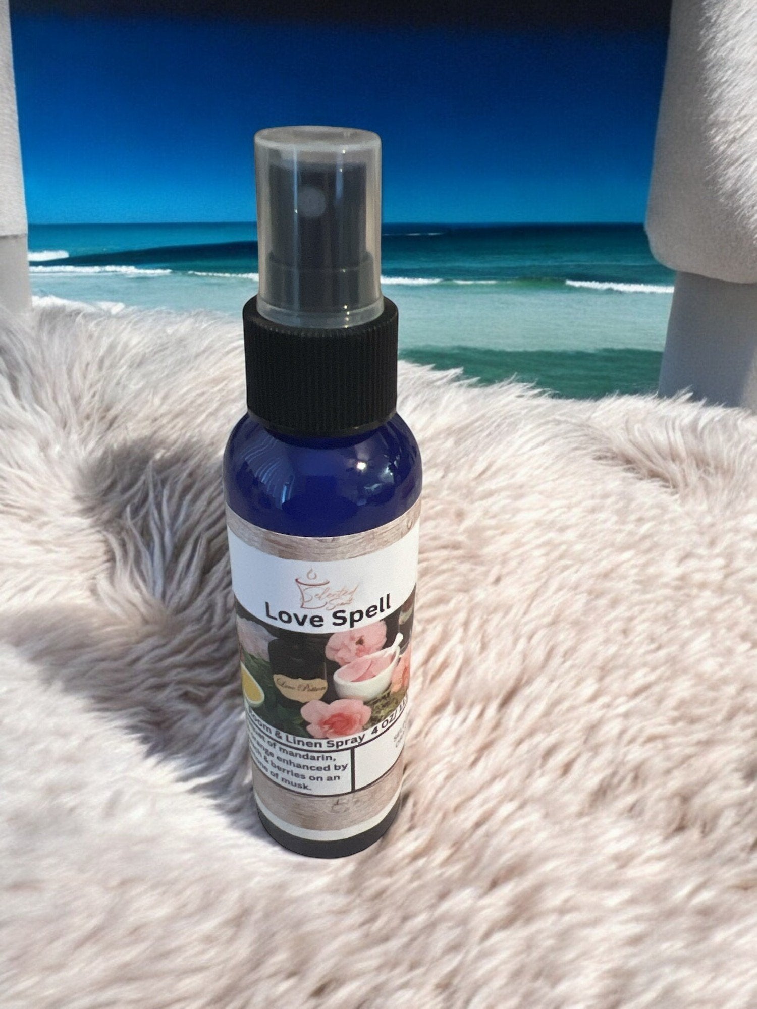 Selected Scent Love Spell long-lasting linen spray for home in a blue bottle with spray nozzle