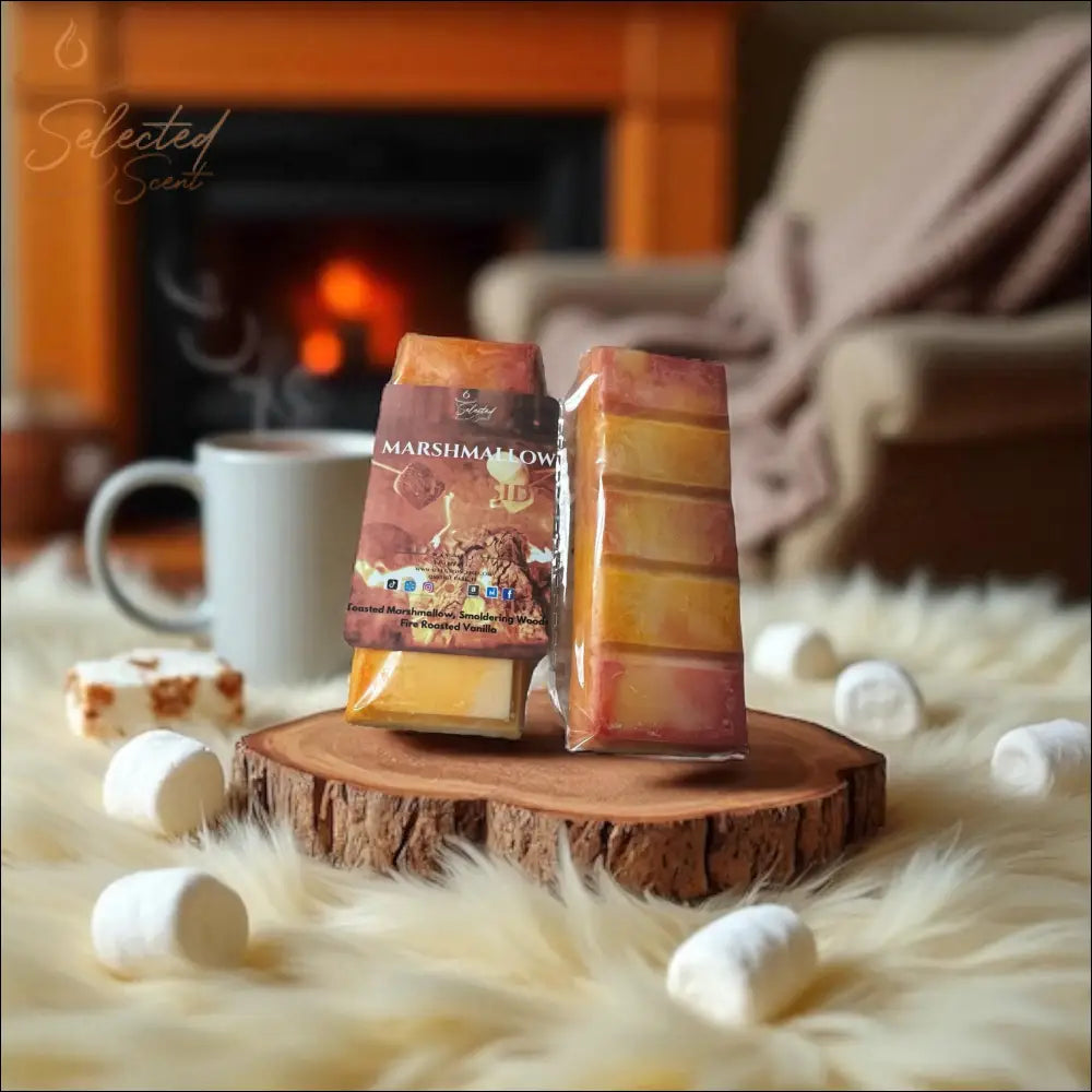 Selected Scent long lasting marshmallow wax melt bars on wooden slab with marshmallows near cozy fireplace
