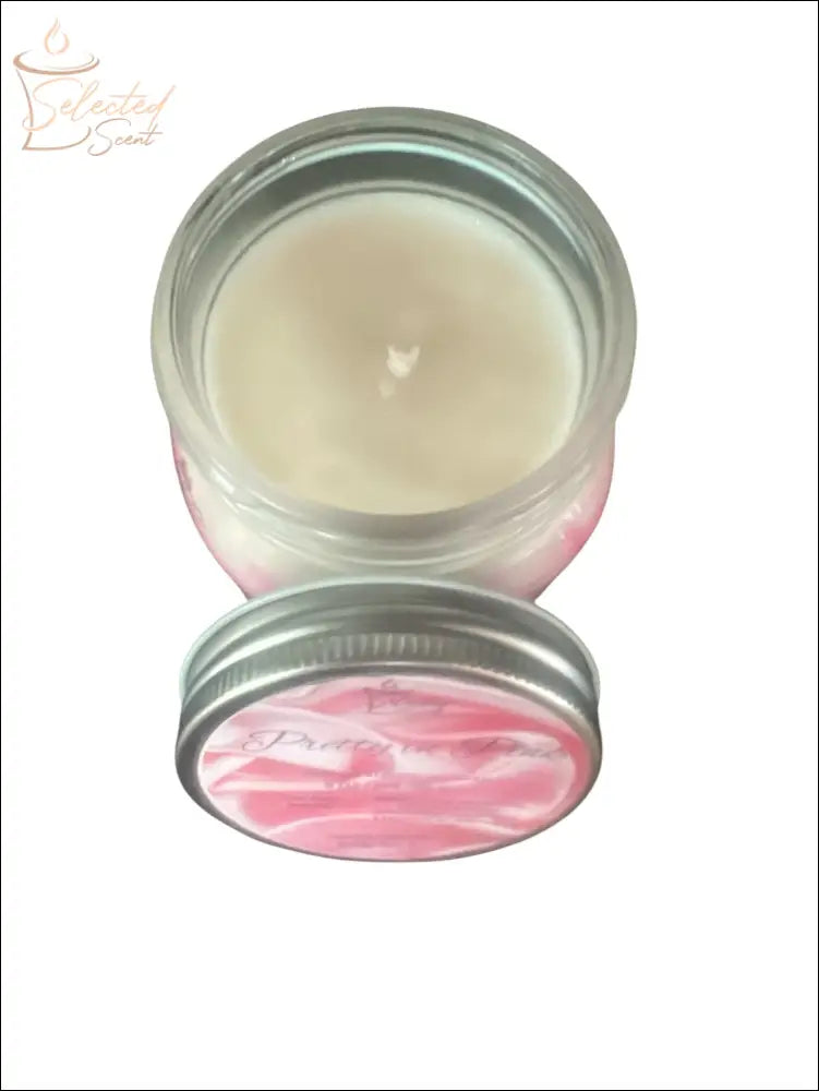 Love Spells You scented candle by Selected Scent in a clear glass jar with silver lid