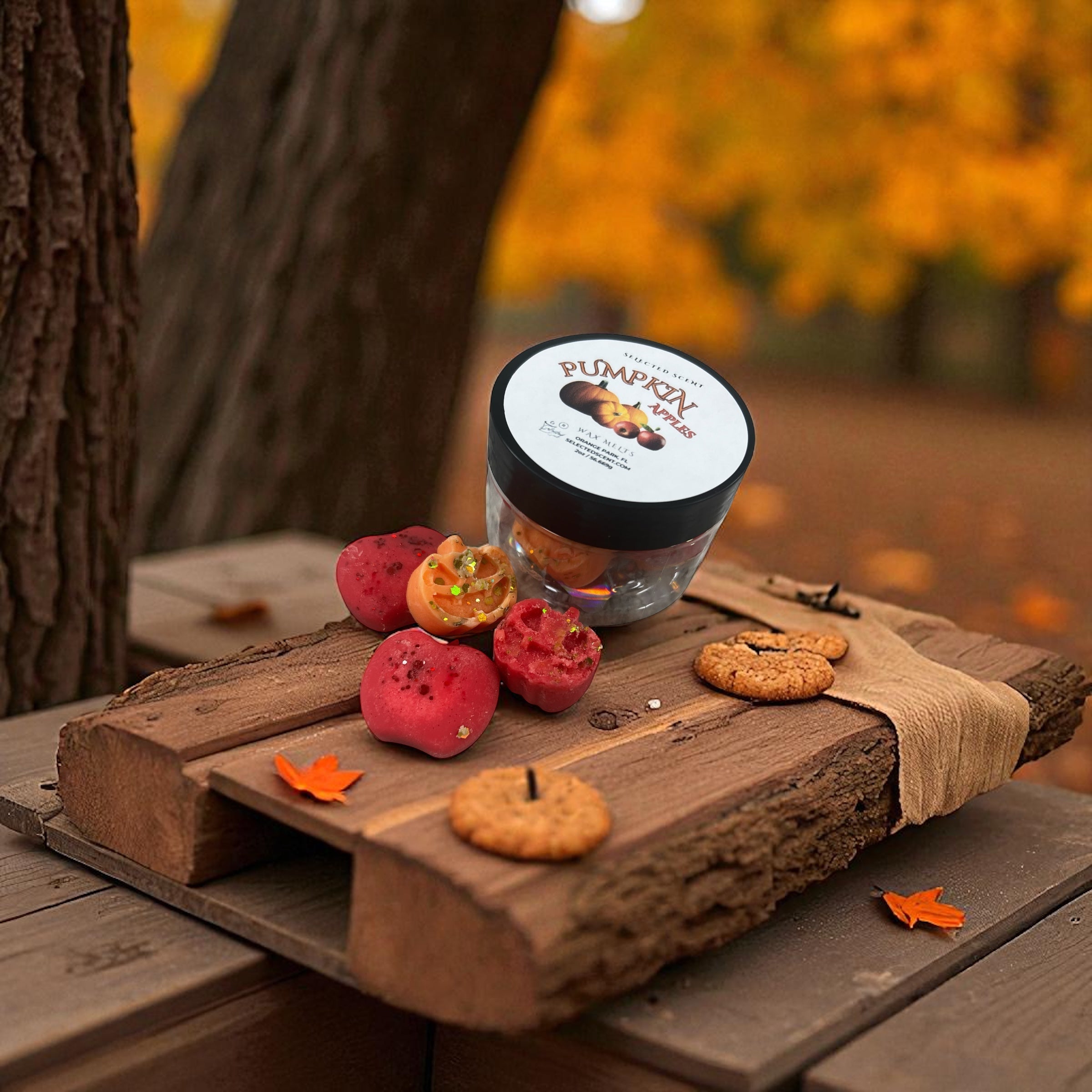 Selected Scent jar of pumpkin wax melts on rustic wood with cookies apples and fall leaves autumn scented home wax melts