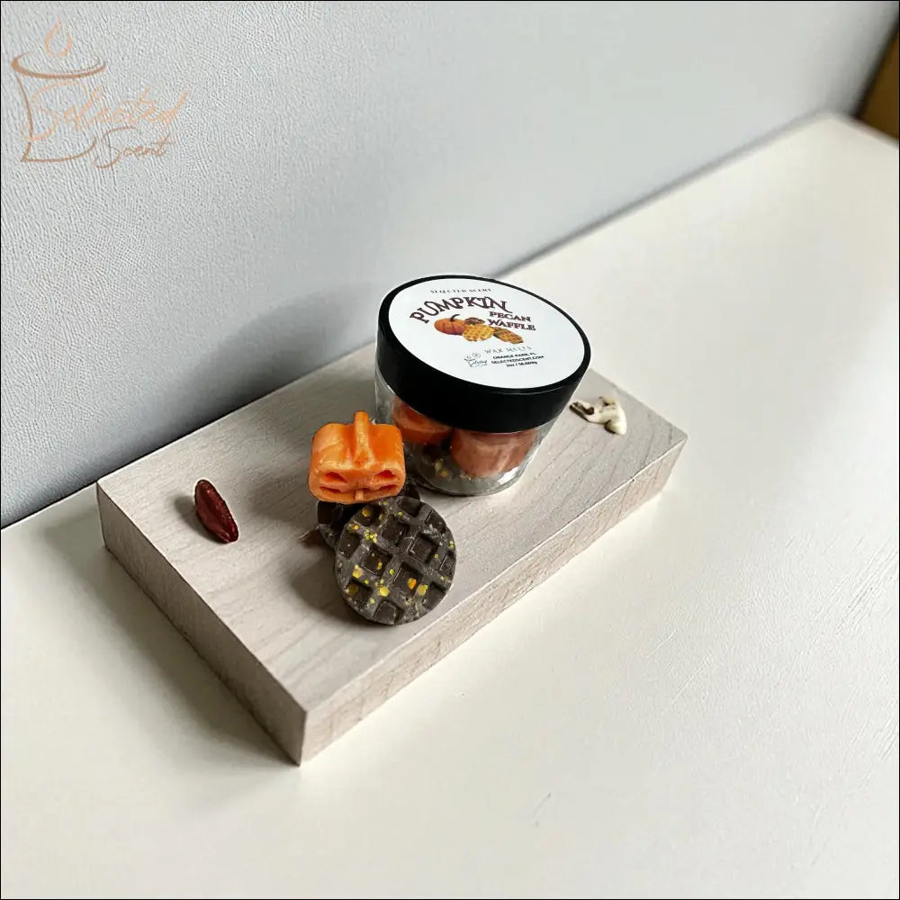 Selected Scent pumpkin pecan waffle wax melts jar with waffle and pumpkin shaped melts on wooden tray