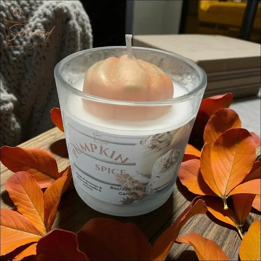 Selected Scent long lasting pumpkin candle 8oz in frosted glass with pumpkin-shaped wick and autumn leaves