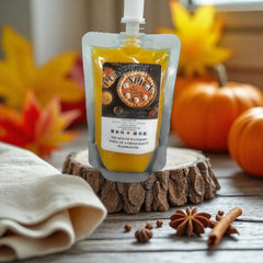 Selected Scent Pumpkin Spice pouch surrounded by pumpkins and fall leaves in a cozy fall setting Fall Seasonal Favorites
