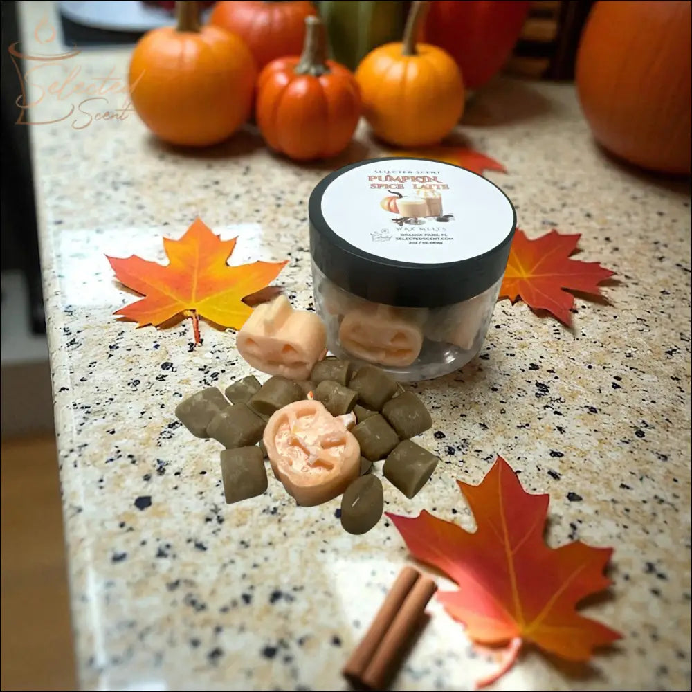 Selected Scent pumpkin spice latte wax melts jar with pumpkin shaped and cube melts on counter