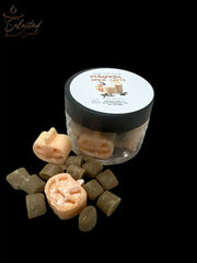 Selected Scent pumpkin spice latte wax melts in jar with jack o lantern and cube melts on black background