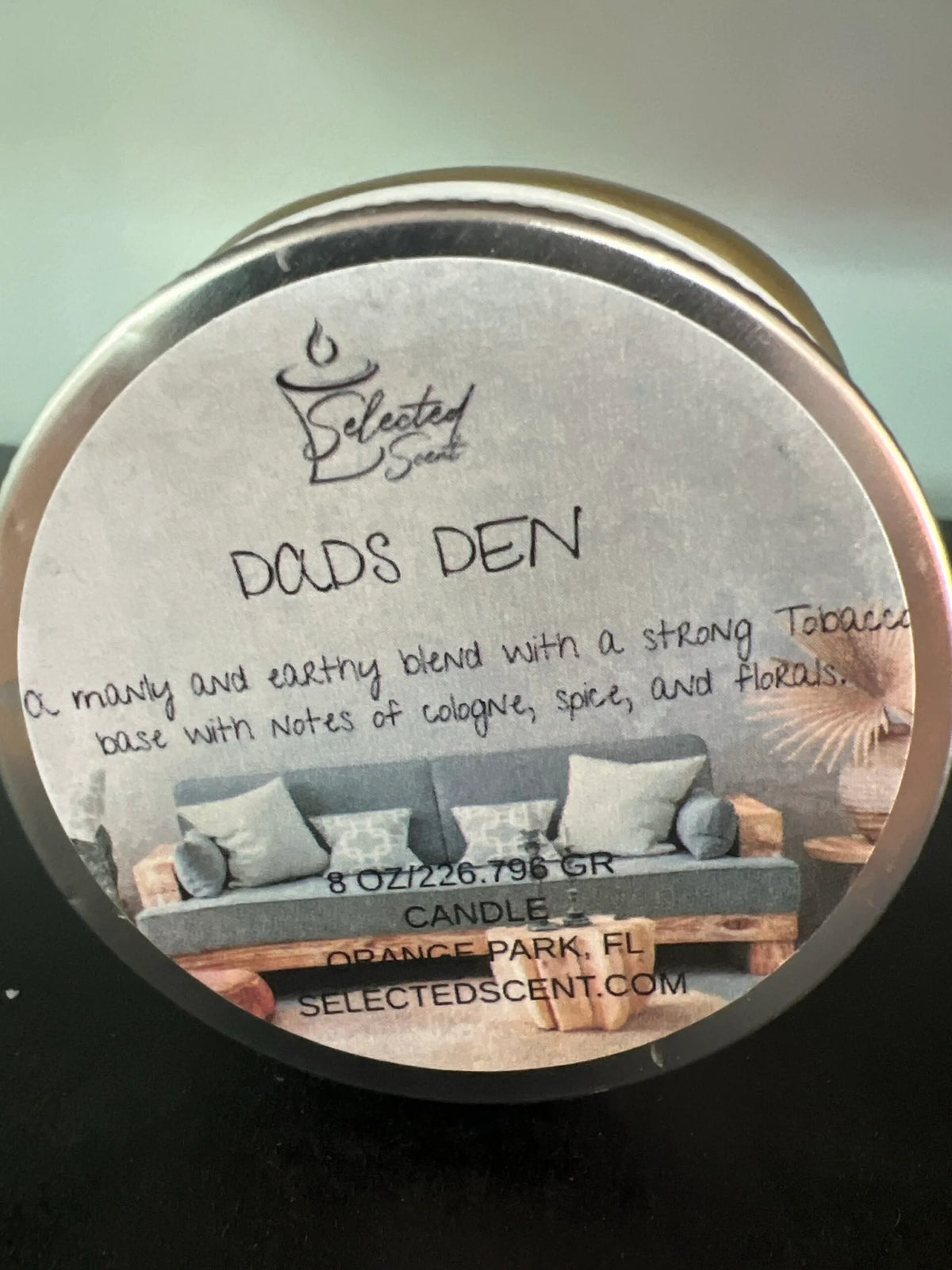 Selected Scent all natural masculine candle labeled Dads Den with earthy tobacco and floral notes