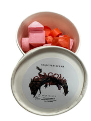 Selected Scent container of dragons blood wax melts with pink and red wax pieces for home fragrance