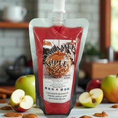 Selected Scent Caramel Apple wax melt pouch surrounded by apples and caramel pieces fall seasonal favorites