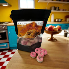 Selected Scent Apple Cider Donut long lasting fall fragrance melts in resealable black pouch on kitchen counter