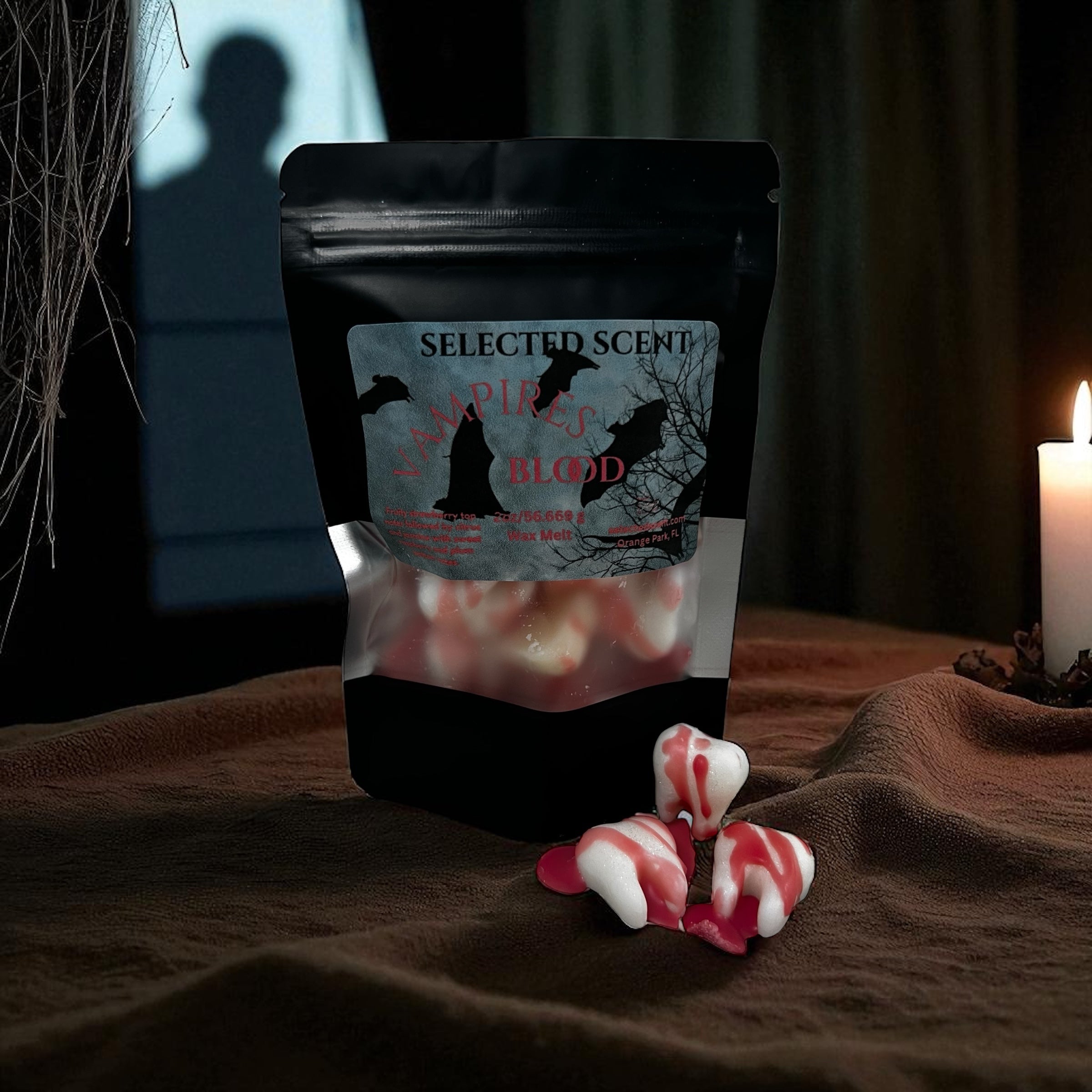 Selected Scent Vampire Blood wax melts with red and white design in spooky Halloween setting unique spooky wax melts