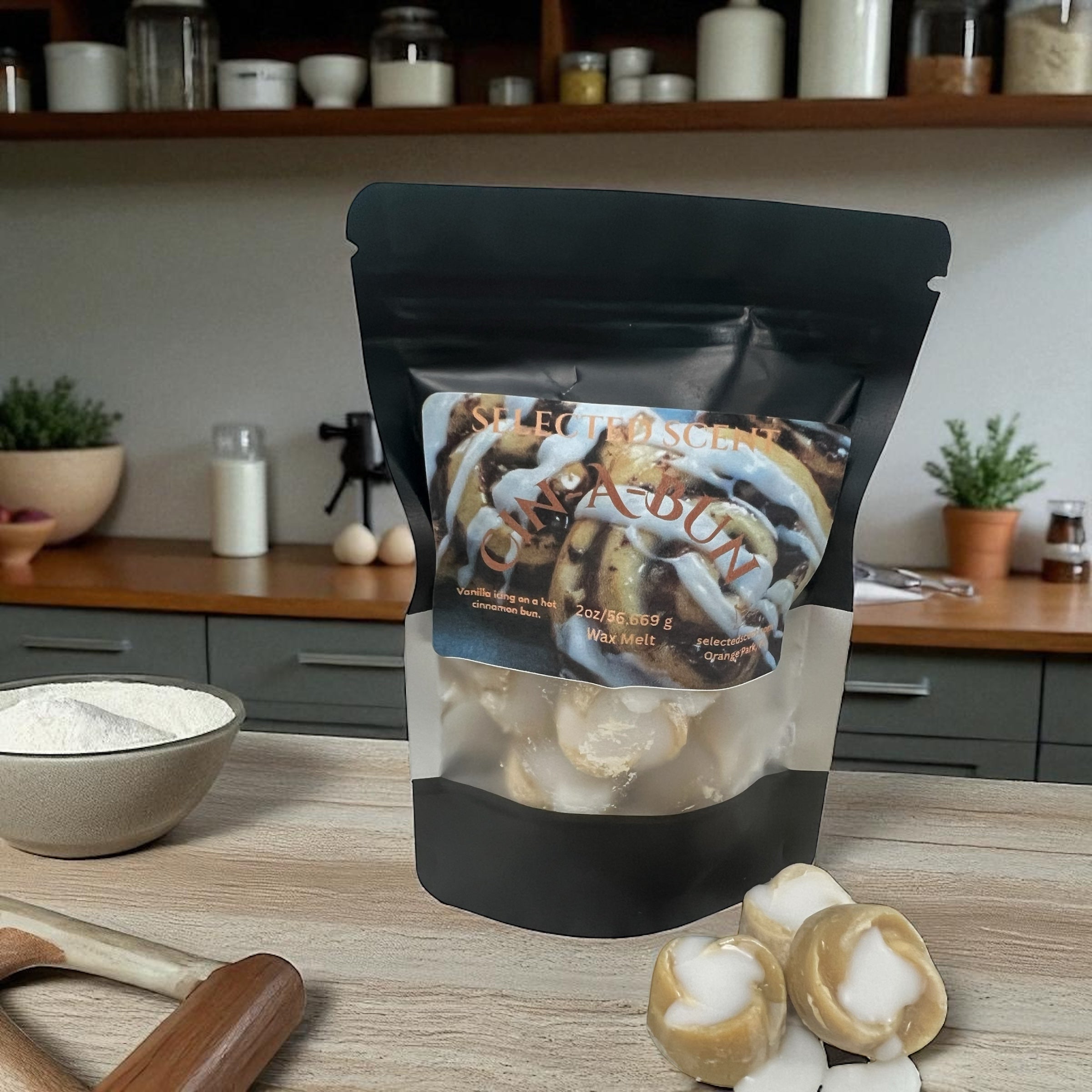 Selected Scent long lasting bakery scented wax melt in cinnamon roll shape package on kitchen counter