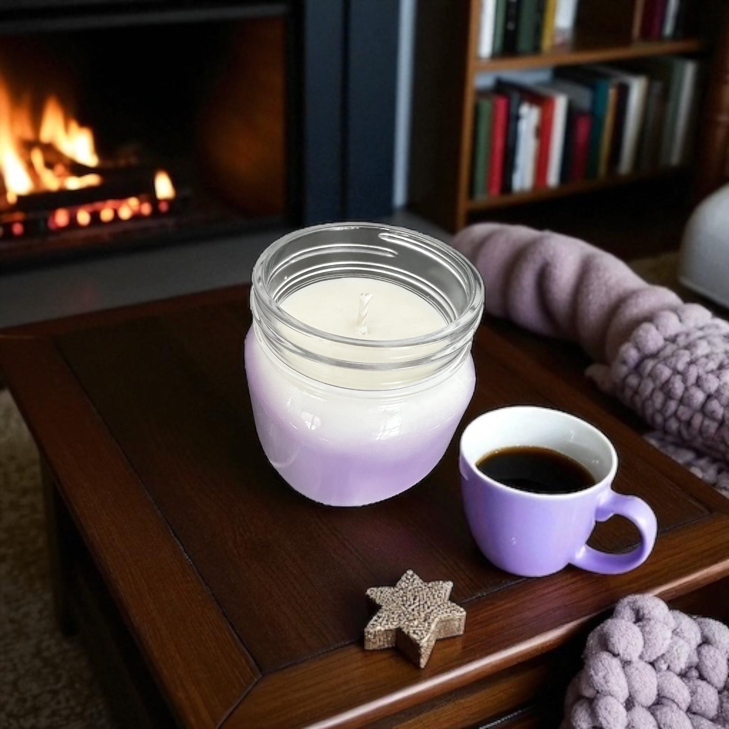 Selected Scent long lasting scented candle in lavender ombre jar on wooden table by fireplace with coffee cup and cozy blanket