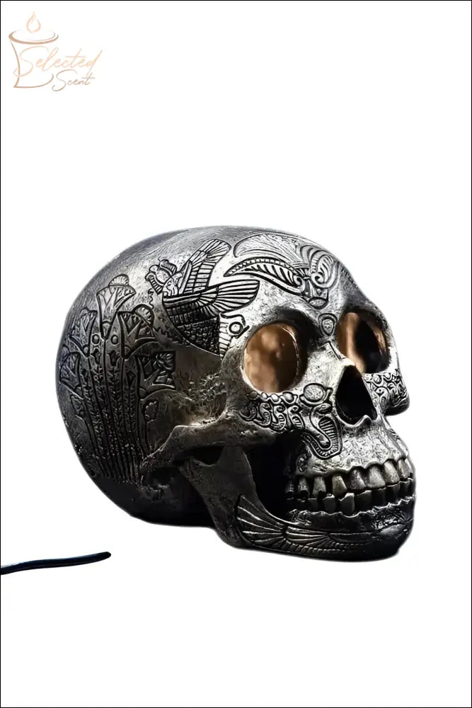 Selected Scent electric decorative warmer shaped like a detailed ornamental skull with engraved patterns