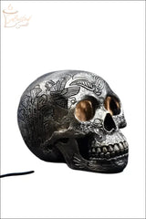 Selected Scent electric decorative warmer shaped like a detailed ornamental skull with engraved patterns
