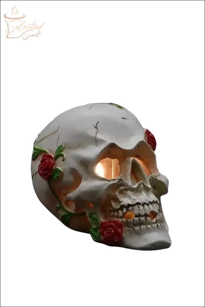 Selected Scent electric decorative warmer shaped like a skull with red roses and glowing light inside