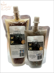 Selected Scent vanilla bourbon wax melt in two sizes with vanilla beans and bourbon bottle on label