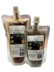 Selected Scent vanilla bourbon wax melt in two sizes with vanilla beans and bourbon bottle on label