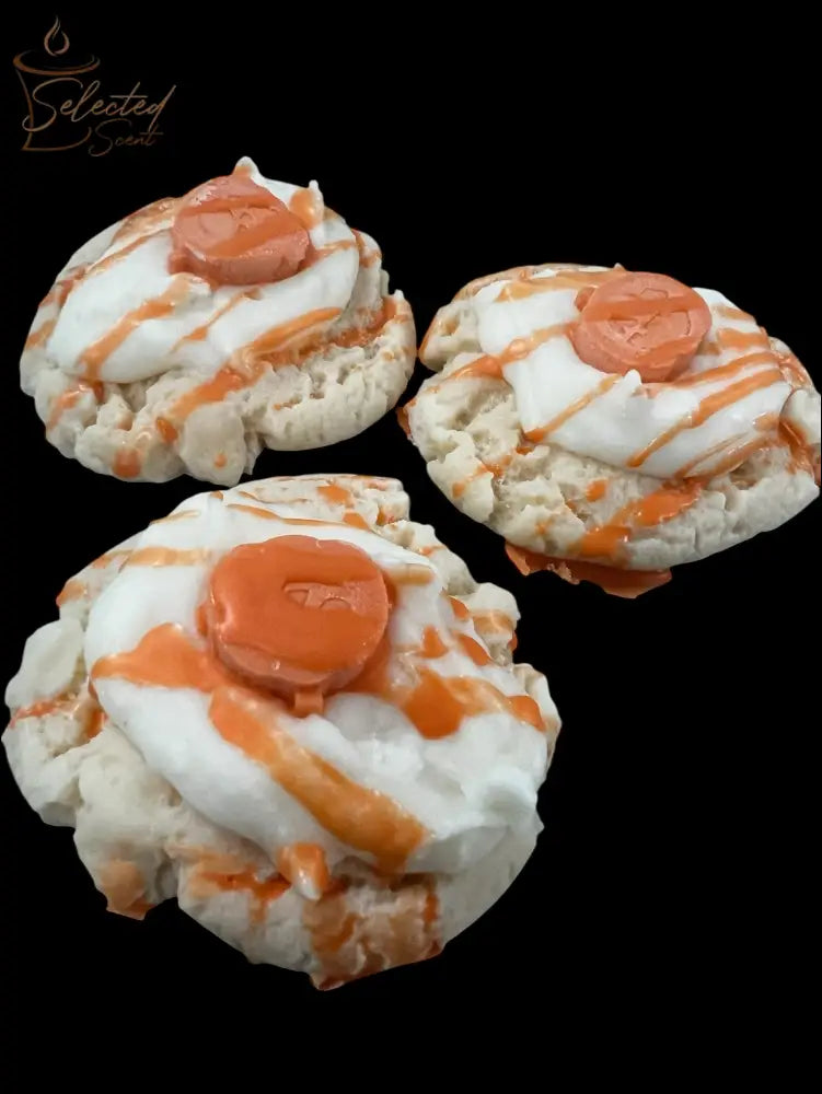 Selected Scent vanilla pumpkin spice wax melts scented three white cookie shaped melts with orange drizzle