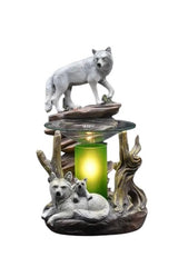 Selected Scent Electric Decorative Warmer featuring white wolf family design with glowing green light