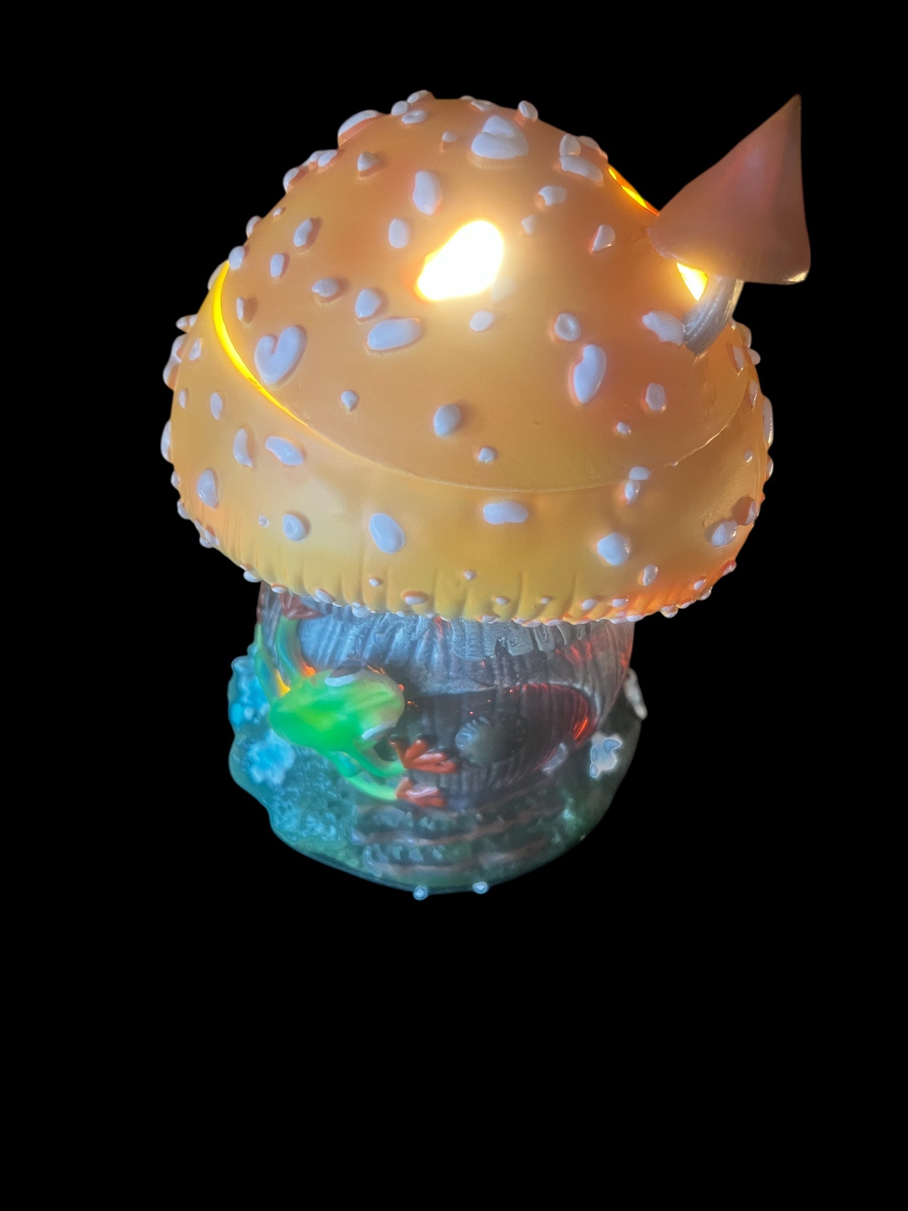 Selected Scent frog and mushroom wax warmer with glowing yellow mushroom cap and small green frog detail