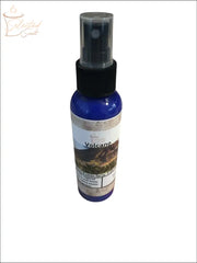 Selected Scent Volcano spray bottle labeled An Eruption of Scent fragrance mist in blue container