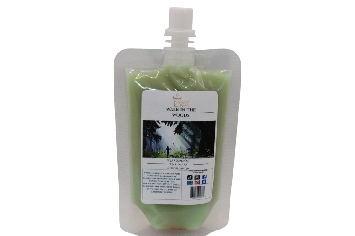 Selected Scent squeezable wax melt in a green refill pouch with Walk in the Woods fragrance