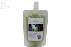 Selected Scent squeezable wax melt in a green refill pouch with Walk in the Woods fragrance