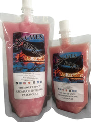 Selected Scent Witches Brew scented wax melts in pink pouches with sweet spicy patchouli for Fall Seasonal Favorites